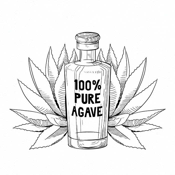 Tequila bottle surrounded by ingredients.